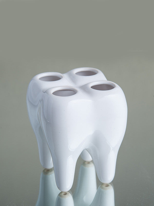 Keramikinis dantų stovas šepetėliams. Baltas.